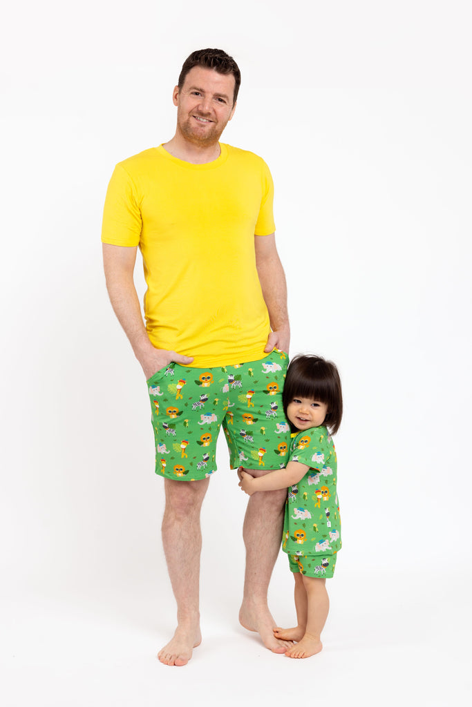 Father and son matching pyjamas in safari animal print